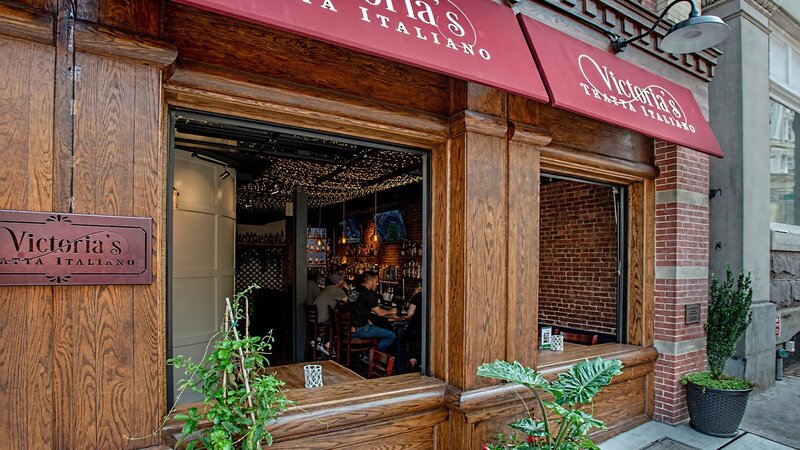 Outside view of restaurant looking into bar seating area